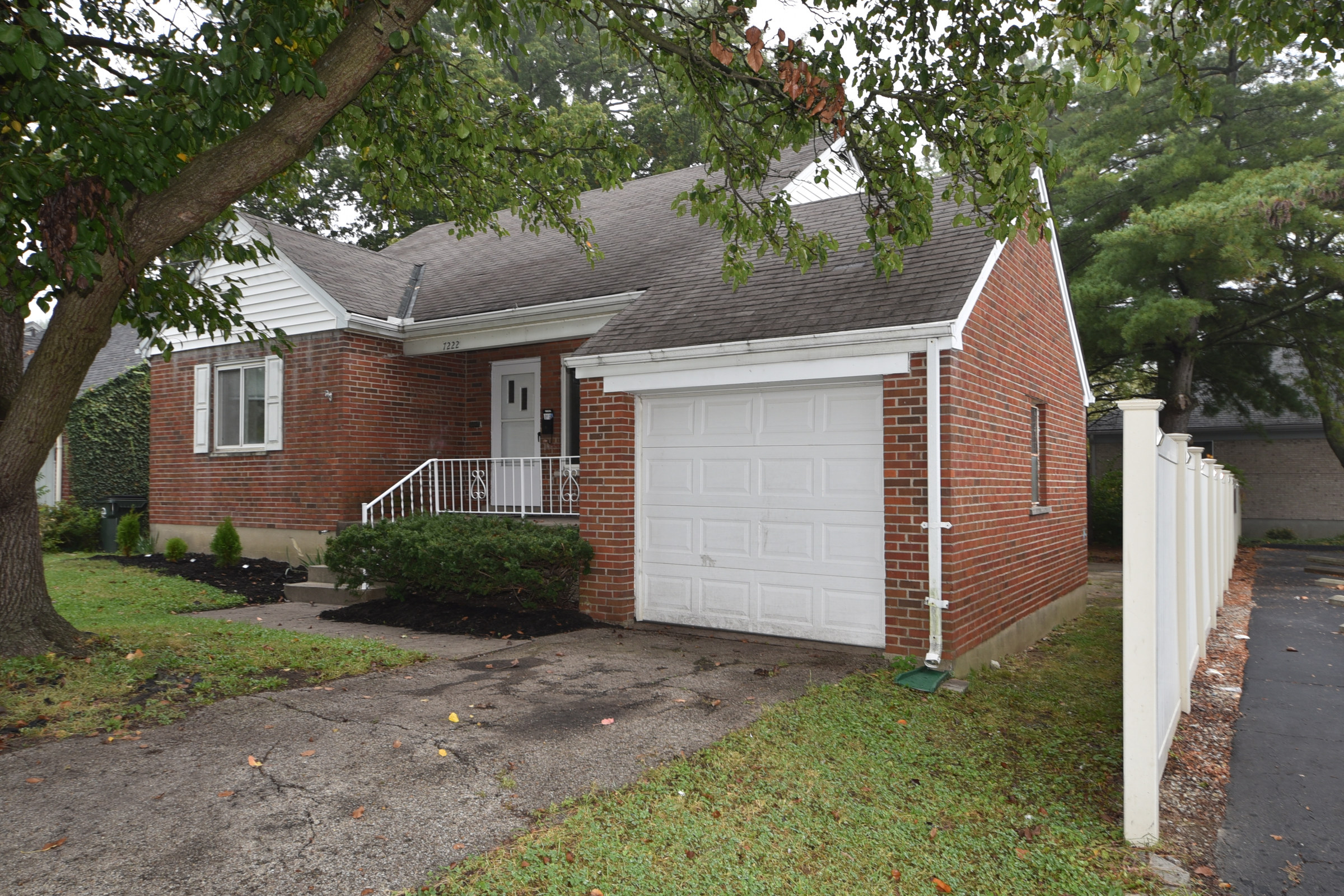 Front porch and attached garage at 7222 Chetbert Drive